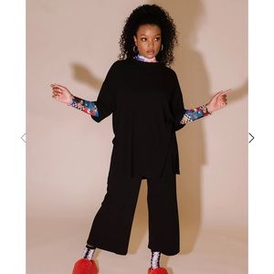 NWOT DRESSED IN LALA PLAYSUIT IN BLACK